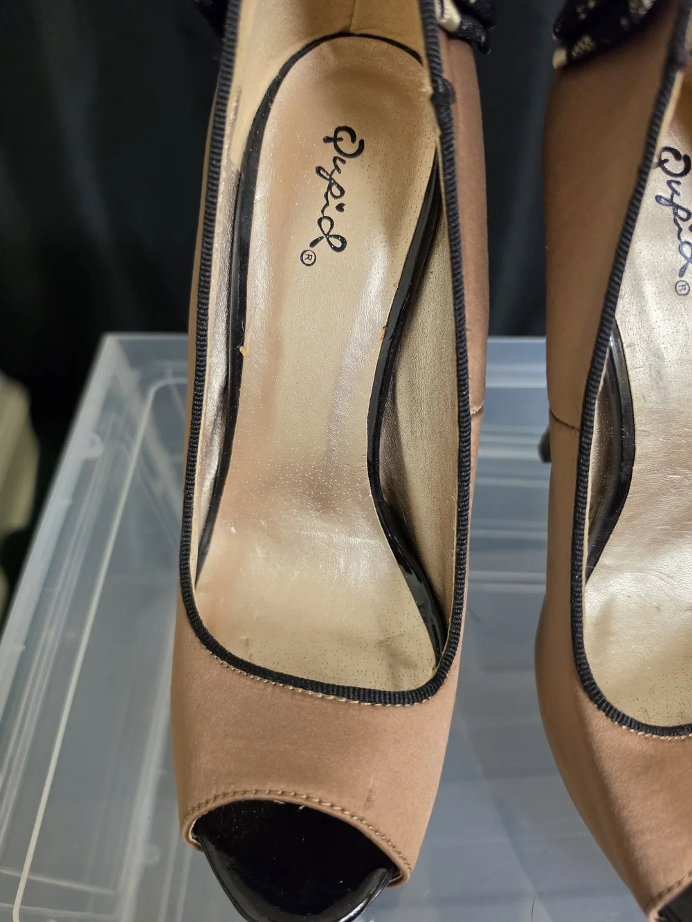 Qupid Blush Peep-Toe Stiletto Heels with Black Trim and Bow Accent